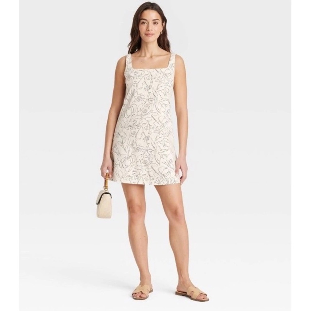 Mini Floral Dress pockets lined. A new day